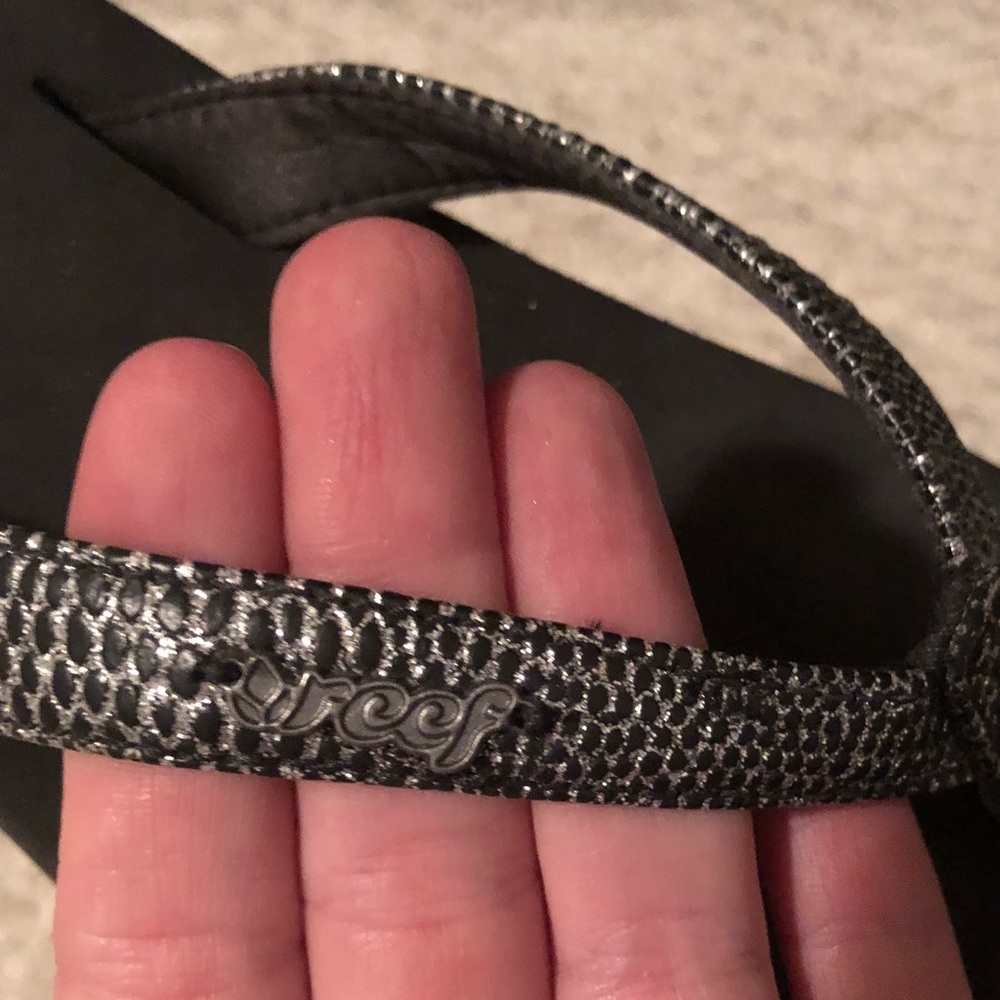 Reef black and silver flip flops